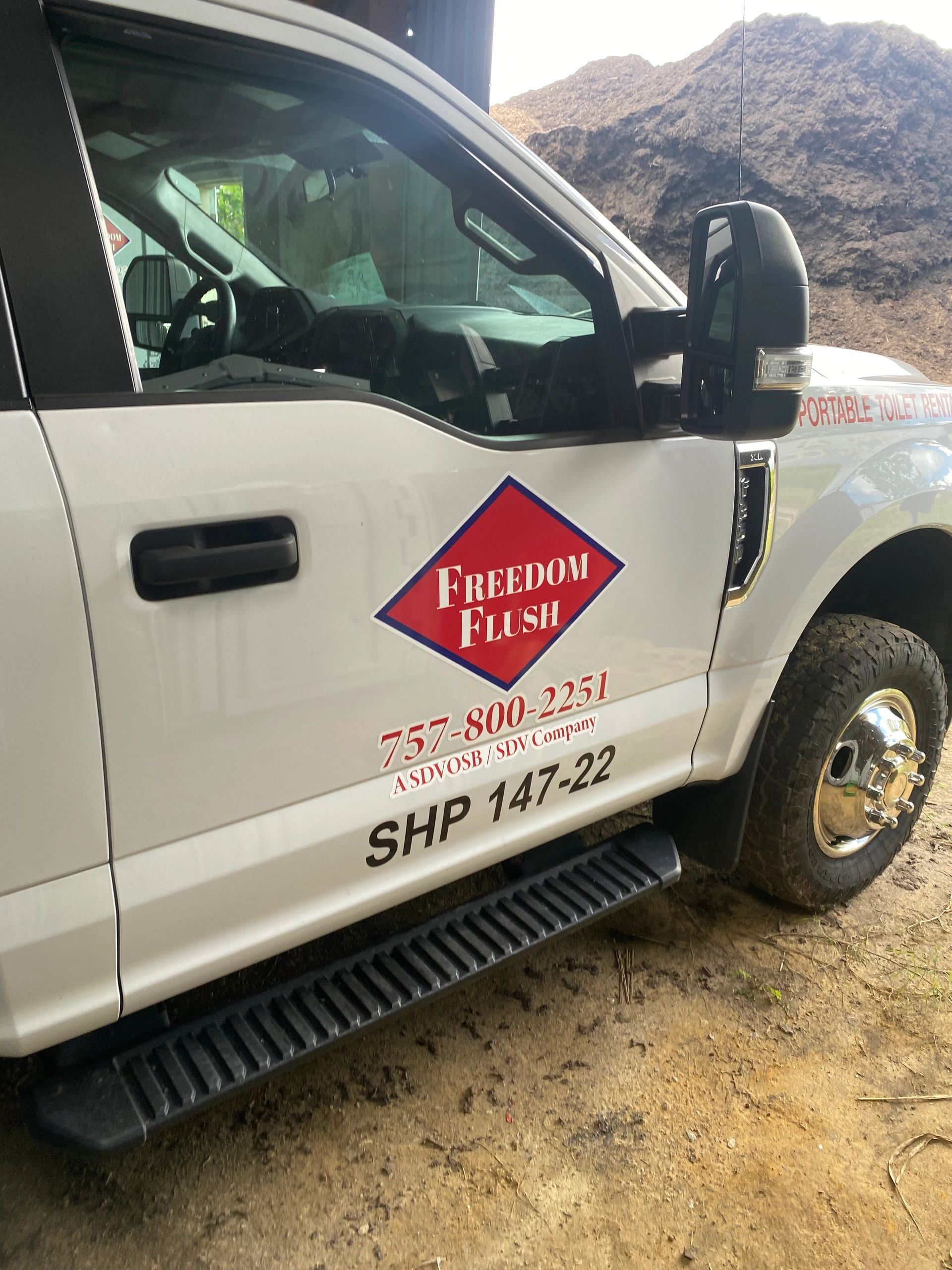 Service truck for portable toilet rental